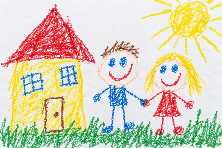 Child's crayon drawing of a house being scanned into the Momora app
